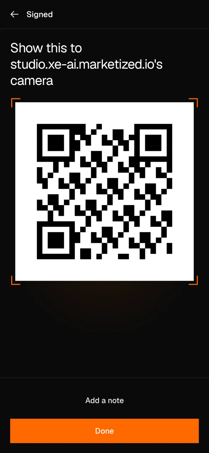 XE Vault on Android after signing: Show this to studio.xe-ai.marketized.io's camera, a large QR code holding the signature, Add a note and Done.